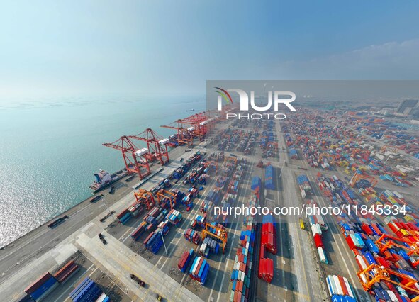 Container cargoes from Qinzhou Automated Container Terminal of Beiwan Port are sold overseas by rail-sea intermodal train on the Western Lan...