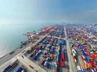 Container cargoes from Qinzhou Automated Container Terminal of Beiwan Port are sold overseas by rail-sea intermodal train on the Western Lan...