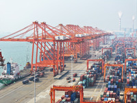 Container cargoes from Qinzhou Automated Container Terminal of Beiwan Port are sold overseas by rail-sea intermodal train on the Western Lan...