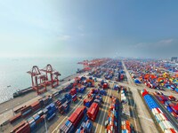 Container cargoes from Qinzhou Automated Container Terminal of Beiwan Port are sold overseas by rail-sea intermodal train on the Western Lan...