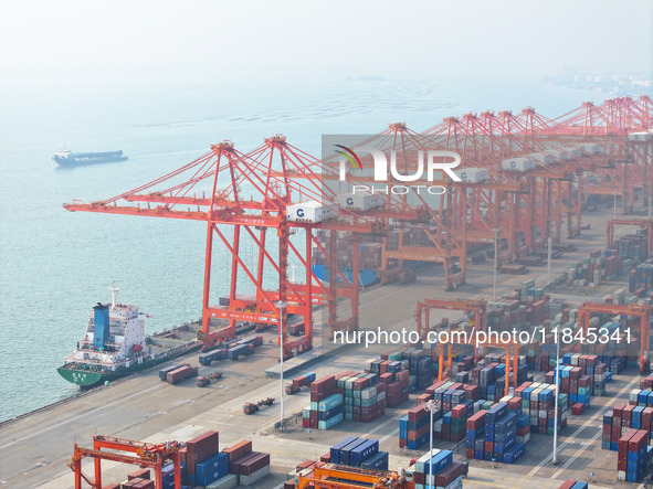 Container cargoes from Qinzhou Automated Container Terminal of Beiwan Port are sold overseas by rail-sea intermodal train on the Western Lan...