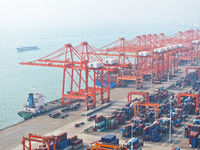 Container cargoes from Qinzhou Automated Container Terminal of Beiwan Port are sold overseas by rail-sea intermodal train on the Western Lan...