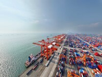 Container cargoes from Qinzhou Automated Container Terminal of Beiwan Port are sold overseas by rail-sea intermodal train on the Western Lan...