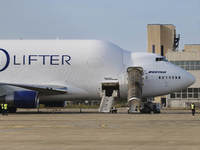 A Boeing 747 Dreamlifter (callsign: N718BA), one of the largest cargo planes in the world, is pictured during cargo operations at Taranto-Gr...