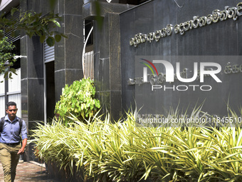 A man walks in front of the Inland Revenue Department in Sri Lanka on December 7, 2024. The IRD extends the deadline for submitting income t...