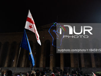 Anti-government protesters rally outside the parliament during a tenth consecutive day of mass demonstrations against the government's postp...