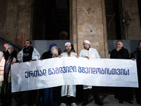 Religious leaders from different denominations demonstrate during a tenth consecutive day of mass demonstrations against the government's po...