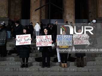 Anti-government protesters rally outside the parliament during a tenth consecutive day of mass demonstrations against the government's postp...