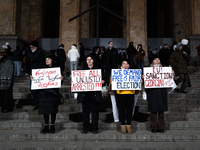 Anti-government protesters rally outside the parliament during a tenth consecutive day of mass demonstrations against the government's postp...