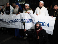 Religious leaders from different denominations demonstrate during a tenth consecutive day of mass demonstrations against the government's po...