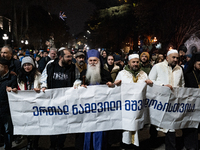 Religious leaders from different denominations demonstrate during a tenth consecutive day of mass demonstrations against the government's po...