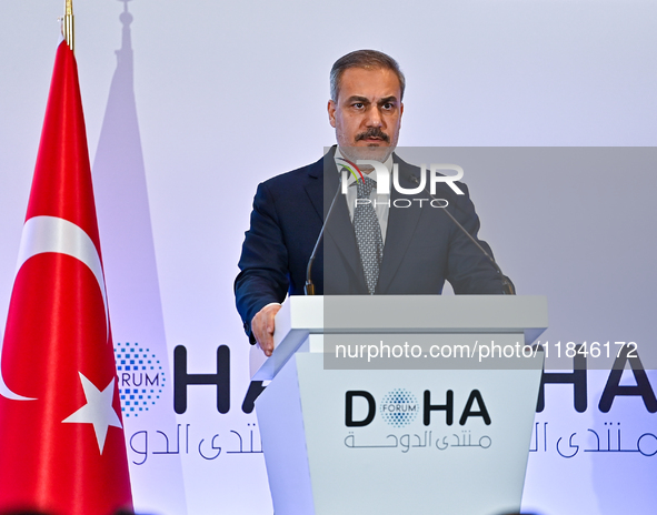 Turkish Foreign Minister Hakan Fidan talks during a press conference held on the sidelines of the Doha Forum 2024 at Sheraton Grand Doha Res...