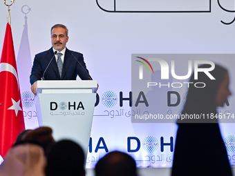 Turkish Foreign Minister Hakan Fidan talks during a press conference held on the sidelines of the Doha Forum 2024 at Sheraton Grand Doha Res...