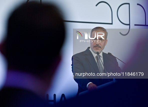 Turkish Foreign Minister Hakan Fidan talks during a press conference held on the sidelines of the Doha Forum 2024 at Sheraton Grand Doha Res...