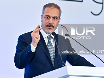 Turkish Foreign Minister Hakan Fidan talks during a press conference held on the sidelines of the Doha Forum 2024 at Sheraton Grand Doha Res...