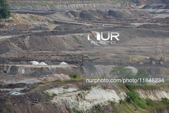 A coal mining truck operates on a haul road at an opencast coalmine in Kalimantan, Indonesia, on December 8, 2024. Environmental activists e...