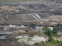 A coal mining truck operates on a haul road at an opencast coalmine in Kalimantan, Indonesia, on December 8, 2024. Environmental activists e...