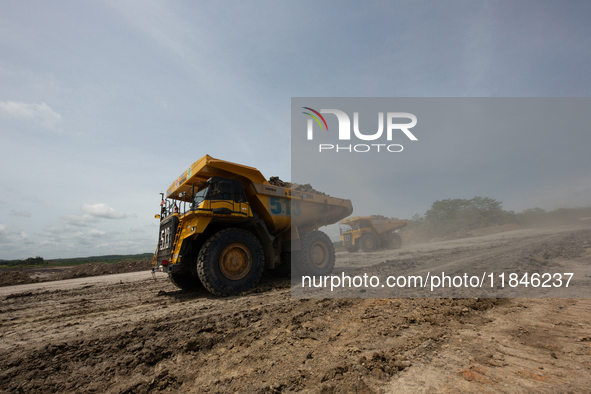 A coal mining truck operates on a haul road at an opencast coalmine in Kalimantan, Indonesia, on December 8, 2024. Environmental activists e...