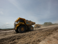 A coal mining truck operates on a haul road at an opencast coalmine in Kalimantan, Indonesia, on December 8, 2024. Environmental activists e...