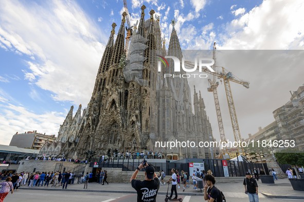 The structure, facade details, and towers form the complete building of the Sagrada Familia cathedral in Barcelona, Spain, on October 9, 202...