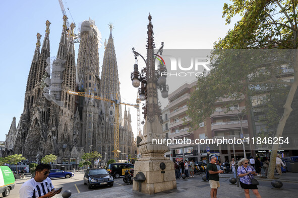 The structure, facade details, and towers form the complete building of the Sagrada Familia cathedral in Barcelona, Spain, on October 9, 202...