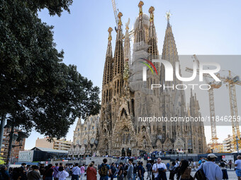 The structure, facade details, and towers form the complete building of the Sagrada Familia cathedral in Barcelona, Spain, on October 9, 202...