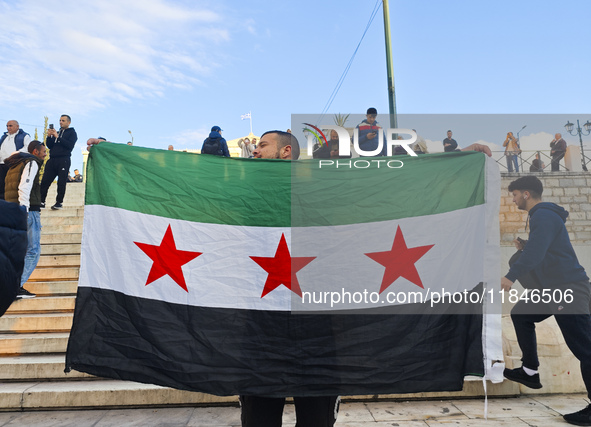 In Athens, Greece, on December 8, 2024, Syrians in Athens celebrate the fall of Assad. 