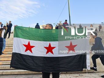 In Athens, Greece, on December 8, 2024, Syrians in Athens celebrate the fall of Assad. (