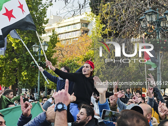 In Athens, Greece, on December 8, 2024, Syrians in Athens celebrate the fall of Assad. (