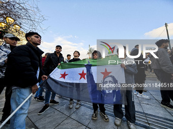 In Athens, Greece, on December 8, 2024, Syrians in Athens celebrate the fall of Assad. (