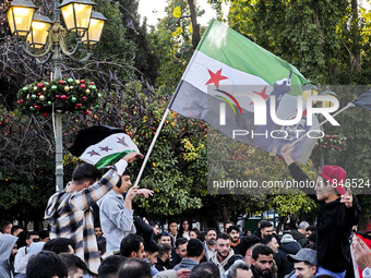 In Athens, Greece, on December 8, 2024, Syrians in Athens celebrate the fall of Assad. (