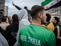 Syrian refugees living in the Onder district of Ankara, Turkey, celebrate the fall of Syrian President Bashar al-Assad after a rapid rebel o...