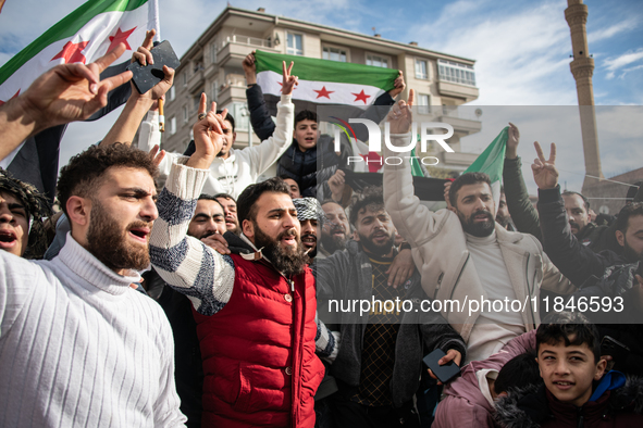 Syrian refugees living in the Onder district of Ankara, Turkey, celebrate the fall of Syrian President Bashar al-Assad after a rapid rebel o...