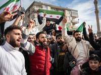 Syrian refugees living in the Onder district of Ankara, Turkey, celebrate the fall of Syrian President Bashar al-Assad after a rapid rebel o...