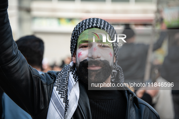 Syrian refugees living in the Onder district of Ankara, Turkey, celebrate the fall of Syrian President Bashar al-Assad after a rapid rebel o...