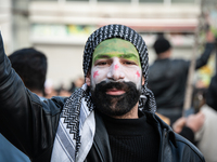 Syrian refugees living in the Onder district of Ankara, Turkey, celebrate the fall of Syrian President Bashar al-Assad after a rapid rebel o...