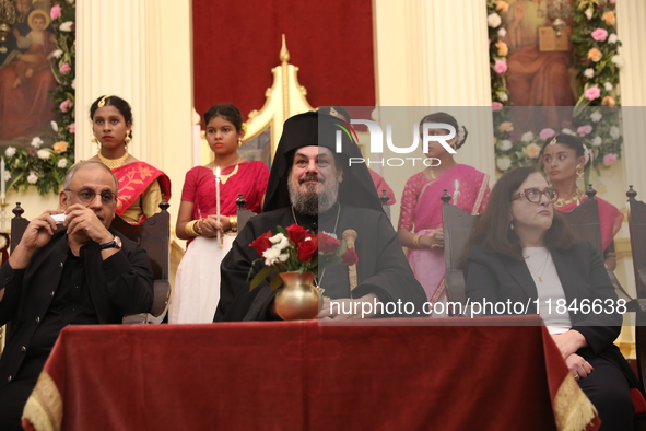 Mr. Raju Bharat, the Warden of the Greek Orthodox Church, Mgr. Konstantinos, H.E. the Metropolitan of Singapore, and Mrs. Aliki Koutsomitopo...