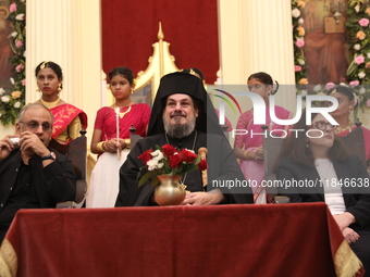 Mr. Raju Bharat, the Warden of the Greek Orthodox Church, Mgr. Konstantinos, H.E. the Metropolitan of Singapore, and Mrs. Aliki Koutsomitopo...