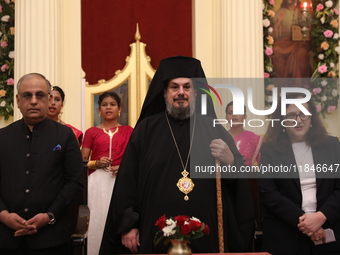 Mr. Raju Bharat, the Warden of the Greek Orthodox Church, Mgr. Konstantinos, H.E. the Metropolitan of Singapore, and Mrs. Aliki Koutsomitopo...