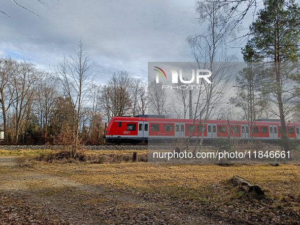 An S-Bahn train of the S6 line travels towards Tutzing in the Munich Metropolitan Area. In Gauting, Bavaria, Germany, on January 2, 2022, a...