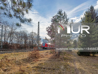 An S-Bahn train of the S6 line travels towards Tutzing in the Munich Metropolitan Area. In Gauting, Bavaria, Germany, on January 2, 2022, a...