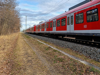 An S-Bahn train of the S6 line travels towards Tutzing in the Munich Metropolitan Area. In Gauting, Bavaria, Germany, on January 2, 2022, a...