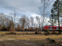 An S-Bahn train of the S6 line travels towards Tutzing in the Munich Metropolitan Area. In Gauting, Bavaria, Germany, on January 2, 2022, a...