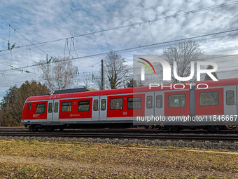 An S-Bahn train of the S6 line travels towards Tutzing in the Munich Metropolitan Area. In Gauting, Bavaria, Germany, on January 2, 2022, a...