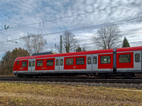 An S-Bahn train of the S6 line travels towards Tutzing in the Munich Metropolitan Area. In Gauting, Bavaria, Germany, on January 2, 2022, a...