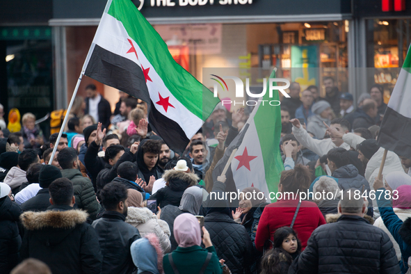 More than a hundred people spontaneously gather in front of Dom Cathedral to celebrate in Cologne, Germany, on December 8, 2024, as the rebe...