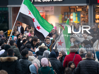 More than a hundred people spontaneously gather in front of Dom Cathedral to celebrate in Cologne, Germany, on December 8, 2024, as the rebe...