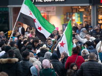 More than a hundred people spontaneously gather in front of Dom Cathedral to celebrate in Cologne, Germany, on December 8, 2024, as the rebe...