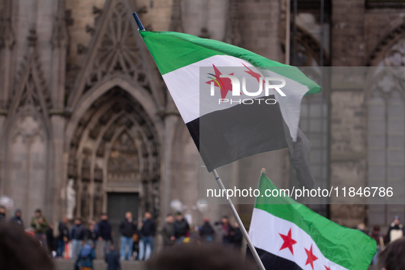 More than a hundred people spontaneously gather in front of Dom Cathedral to celebrate in Cologne, Germany, on December 8, 2024, as the rebe...