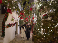 In Locorotondo, Italy, on December 7, 2024, the historic center transforms into a Christmas wonderland. Through self-funding efforts, the vi...